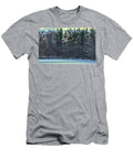 A Mallard Duck Gains Altitude Above a Frozen Lake Ronald Rovtar T-Shirt