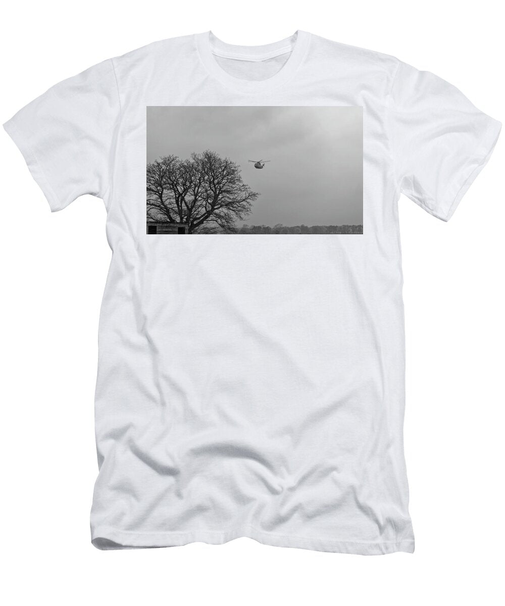 A Merlin Mk 4 Helicopter Approaching Hms Condor Flying Over the Fields of Colliston Jules Walters T-Shirt