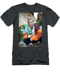 A Women Squats Down and Looks Jay Reilly T-Shirt