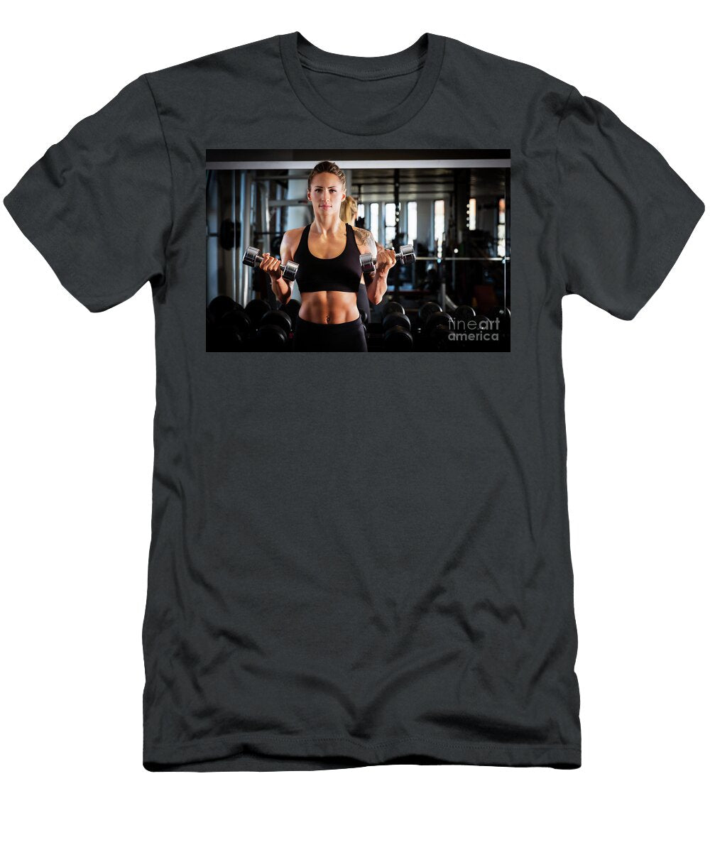 Attractive Woman Exercising At the Gym Michal Bednarek T-Shirt