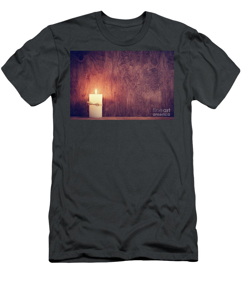 Chistmas Candle Glowing on Wooden Wall Background Michal Bednarek T-Shirt