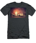 Chistmas Presents Gifts with a Candle Glowing on Wooden Wall Background Michal Bednarek T-Shirt