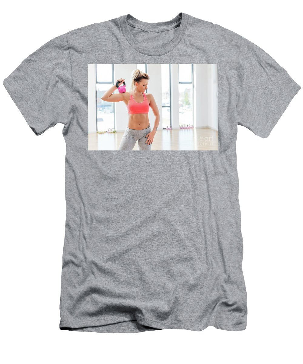 Fit Woman Holding a Kettlebell After Finished Workout Michal Bednarek T-Shirt