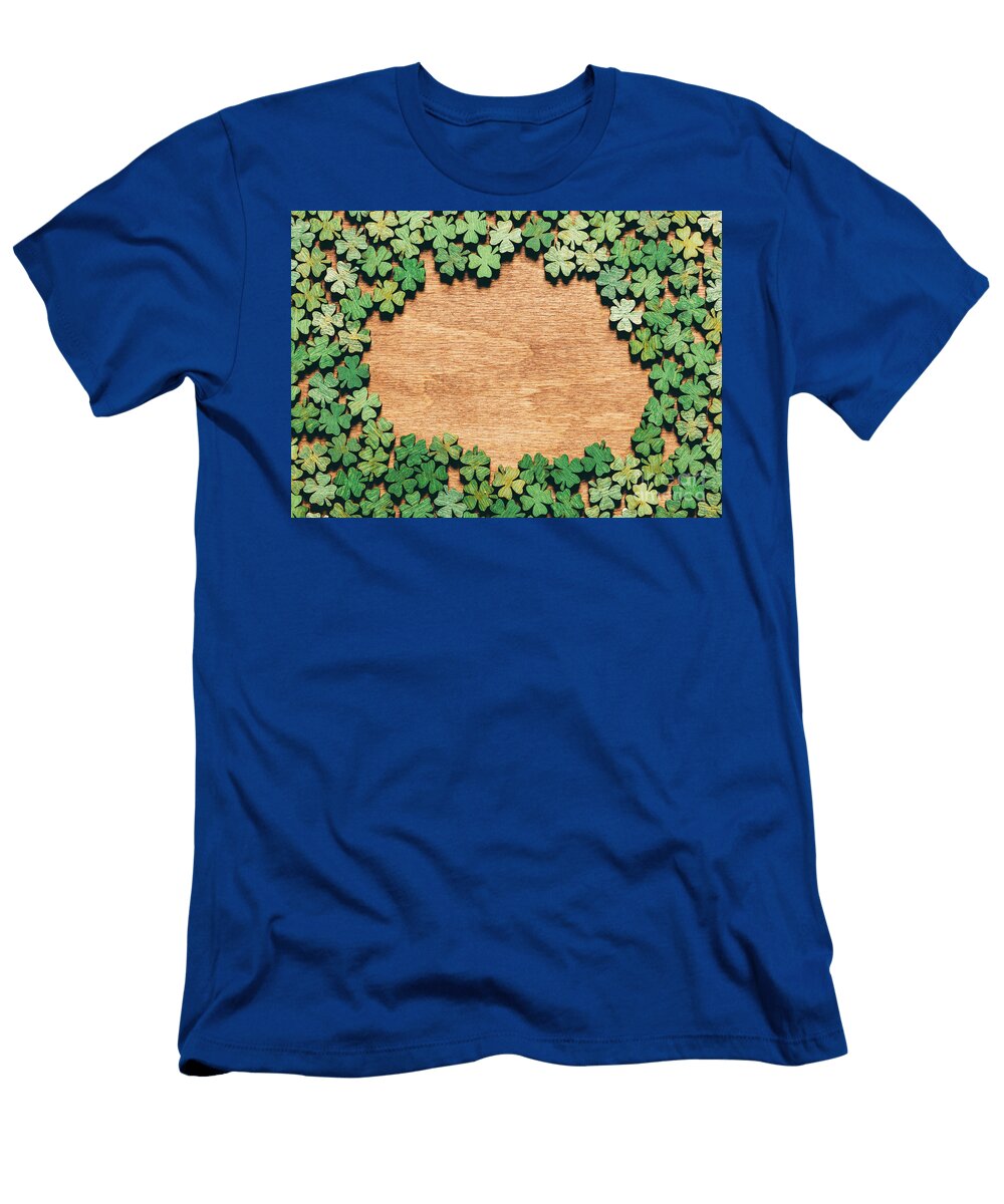 Four Leaf Clovers Laying on Wooden Floor Michal Bednarek T-Shirt