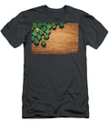 Green Wooden Four Leaf Shamrocks on Wooden Board Michal Bednarek T-Shirt