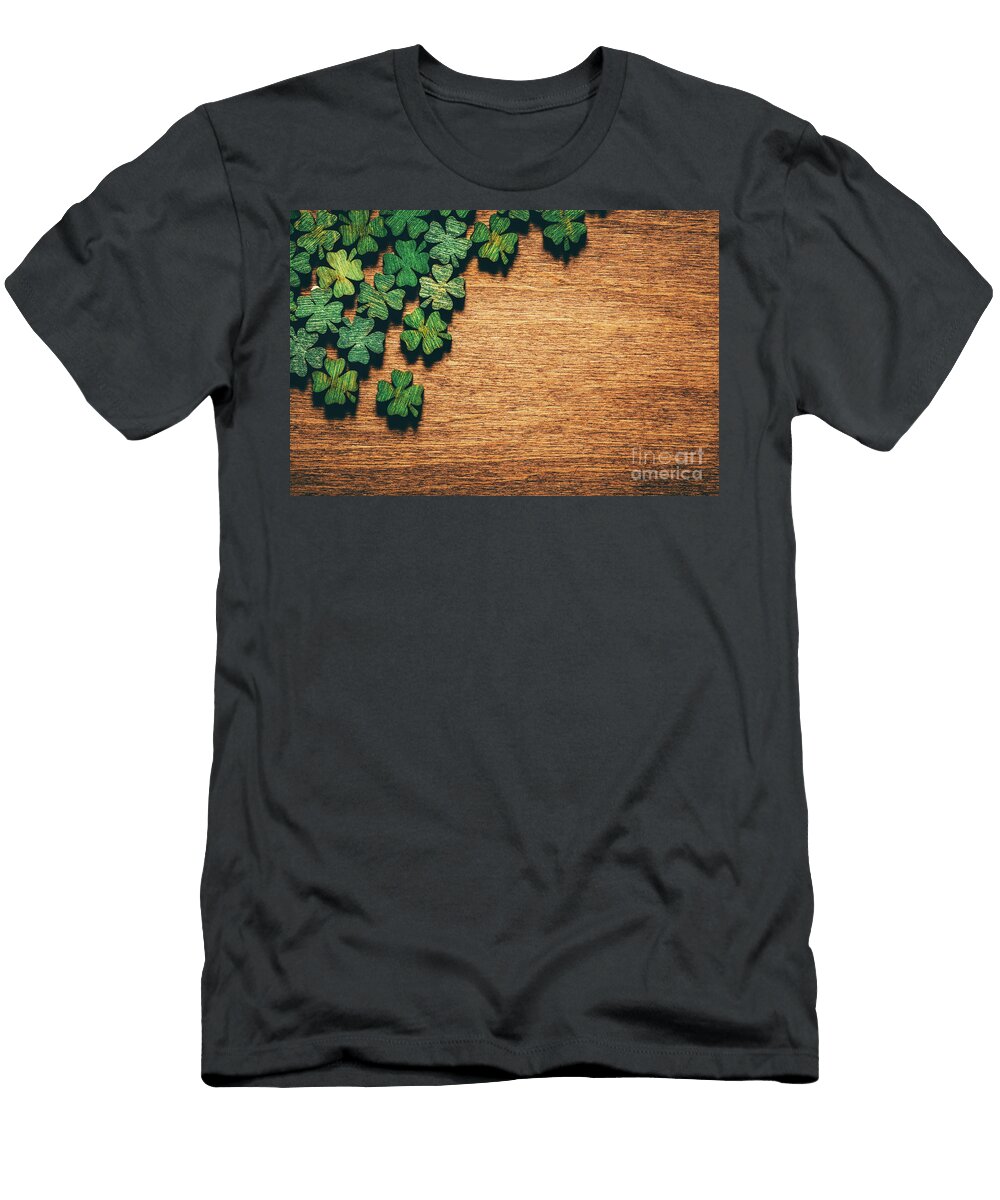 Green Wooden Four Leaf Shamrocks on Wooden Board Michal Bednarek T-Shirt