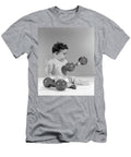 Grumpy Baby Lifting a Dumbbell C 1960s H Armstrong Robertsclassicstock T-Shirt