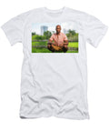 Handsome Man in a Squat Pose Wearing a Pink and Shorts Af Felix Mizioznikov T-Shirt