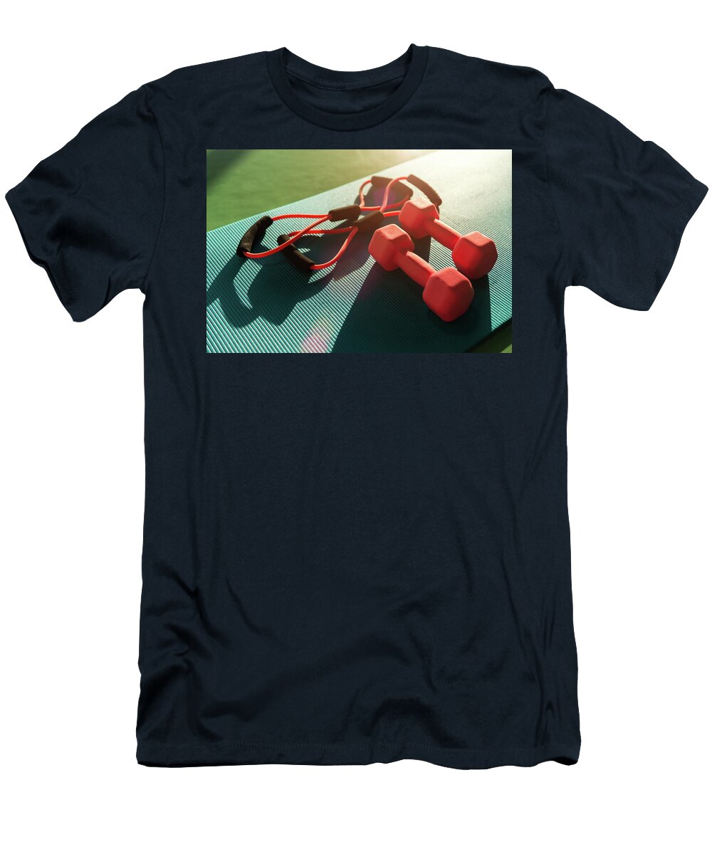 Mat Placed on Floor with Rubber Expander and Two Dumbbells in Fitness Club Maria Kray T-Shirt