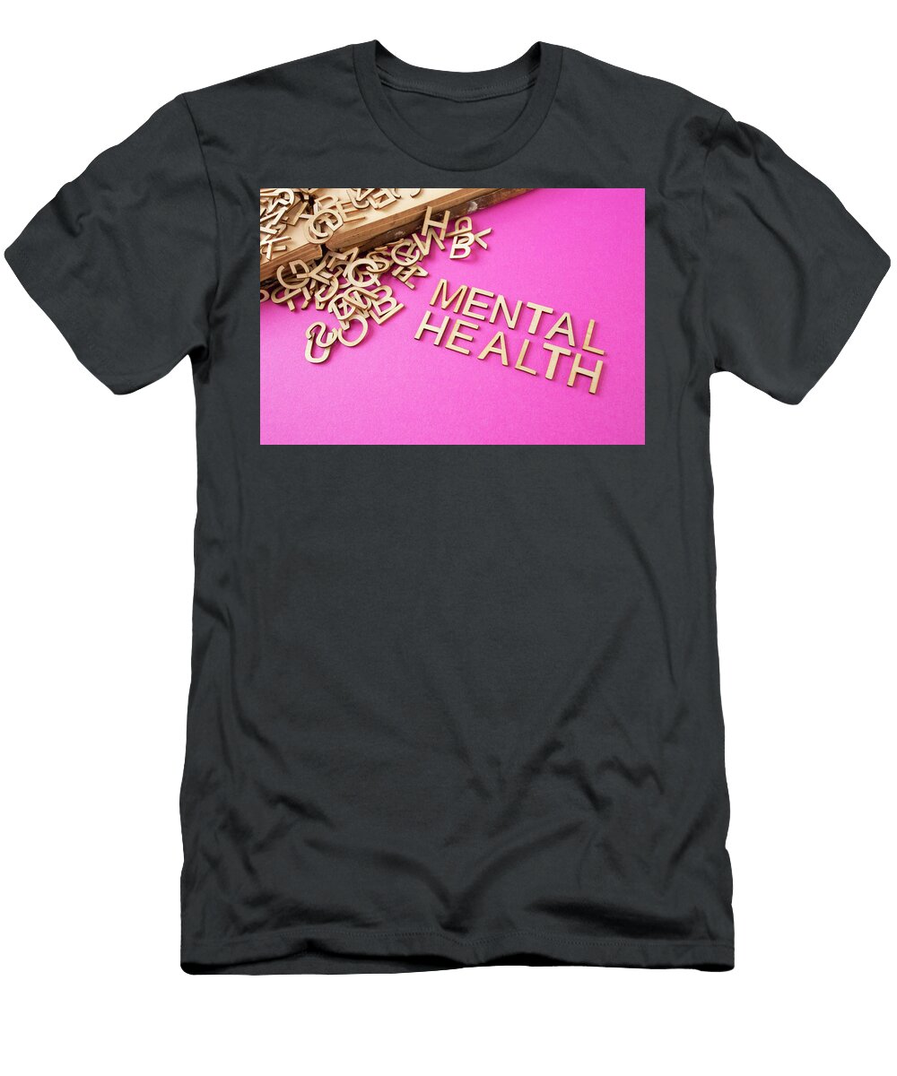 Mental Health Words Written with Wooden Letters Next to a Opene Dorin Puha T-Shirt
