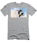 Pair of Canada Geese Flying At Sunrise Phillip Espinasse T-Shirt