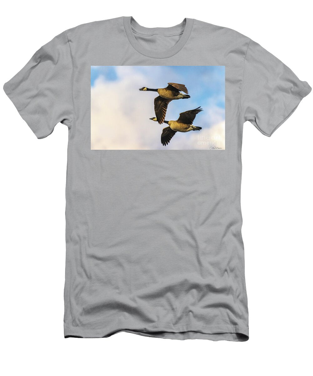 Pair of Canada Geese Flying At Sunrise Phillip Espinasse T-Shirt
