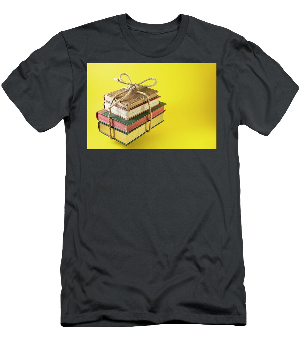 Vintage Books Staked and Tied with a Jute Rope Isolated Dorin Puha T-Shirt