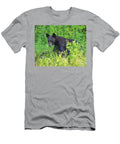 Young Black Bear in Vegetation Timothy Flanigan T-Shirt